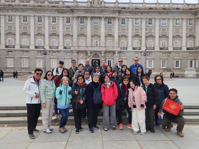 Super Travels tour group at the Royal Palace of Madrid, Spain