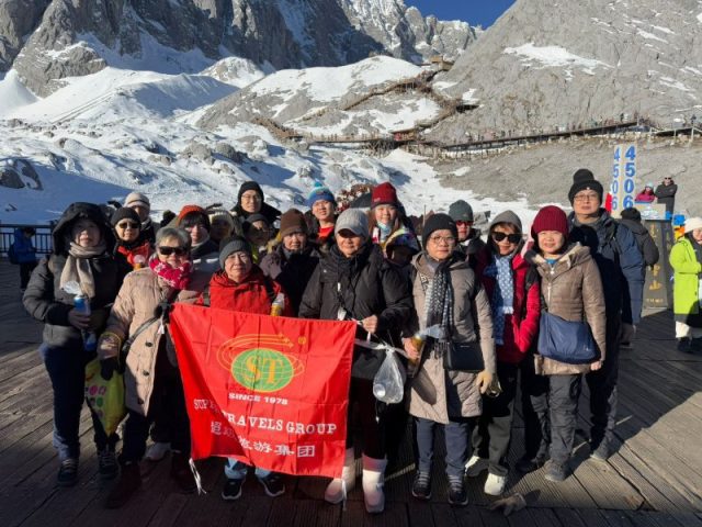 Super Travels tour group at the Jade Dragon Snow Mountain glacier, Lijiang