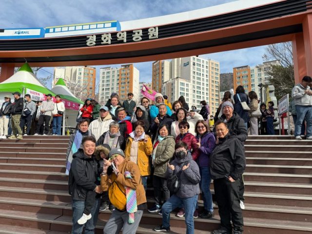 Super Travels tour group at Gyeonghwa Station Park, Jinhae, South Korea