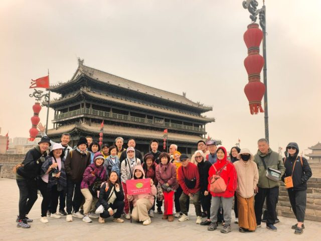 Super Travels tour group on the Xi'an city wall